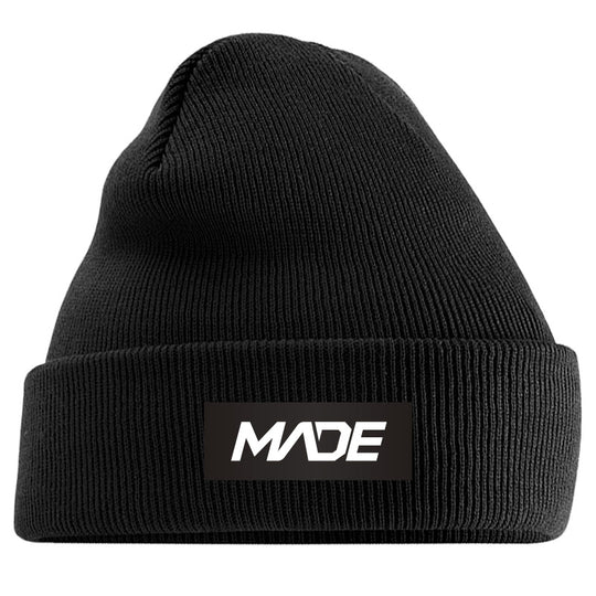 Black beanie with 'MADE' logo on a black background - Madestickers.com Black#color_black